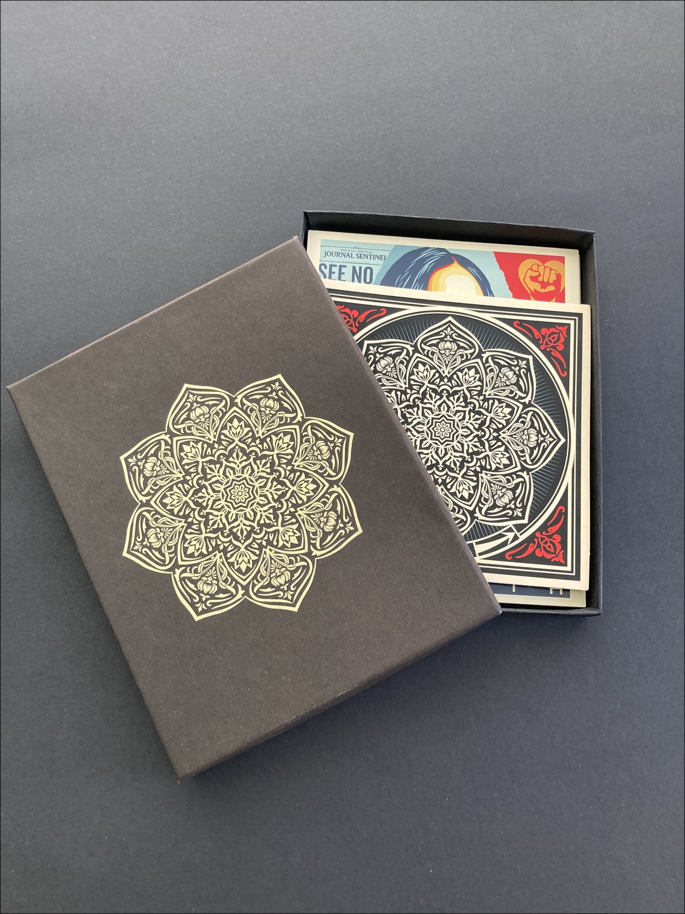 Shepard Fairey – Reframe, sticker box and cards