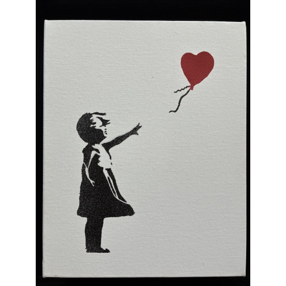 BANKSY La ragazzina con la palla sul tetto