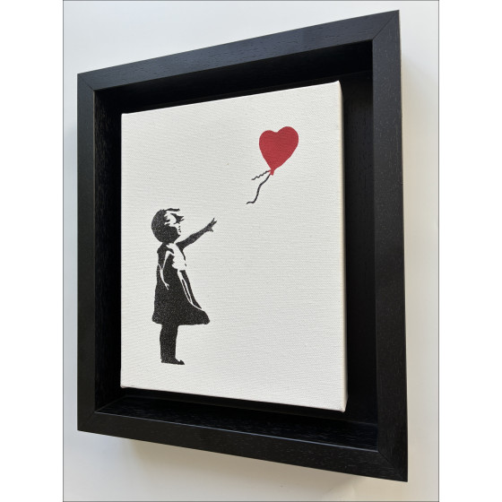 BANKSY La ragazzina con la palla sul tetto
